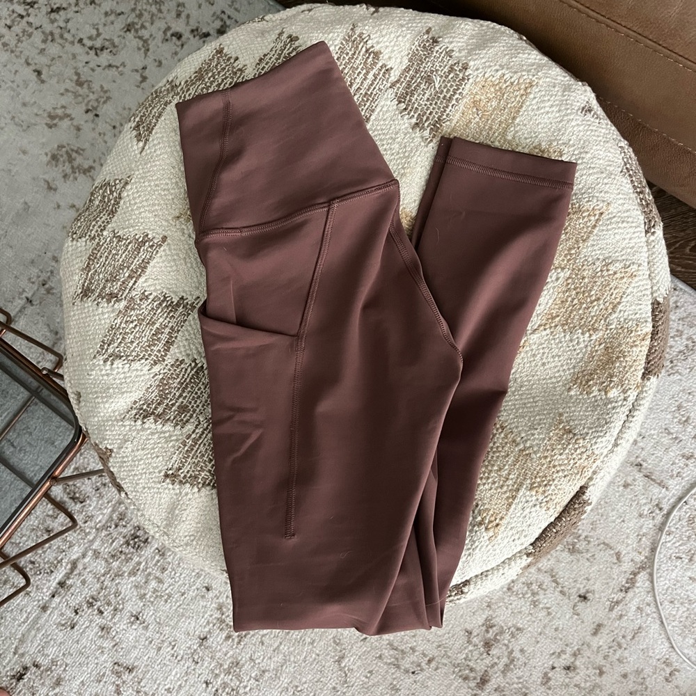 NWOT Wunder Train High-Rise Tight with Pockets 25"